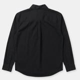 A black long-sleeve button-up shirt shown from the back, featuring a subtle vertical pleat down the center back, laid flat against a light gray background.
