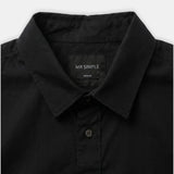 Close-up of a black long-sleeve button-down shirt collar with a visible MR SIMPLE neck label, on a light gray background.