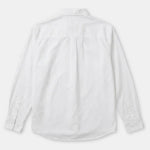 A white long-sleeve button-up shirt shown from the back, laid flat against a light gray background.