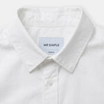 Close-up of a white long-sleeve button-down shirt collar with a light blue interior label reading 'MR SIMPLE' and 'MEDIUM'.