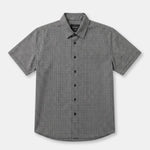 A short-sleeve button-up shirt with a small black and white micro-check pattern, displayed flat against a light gray background.