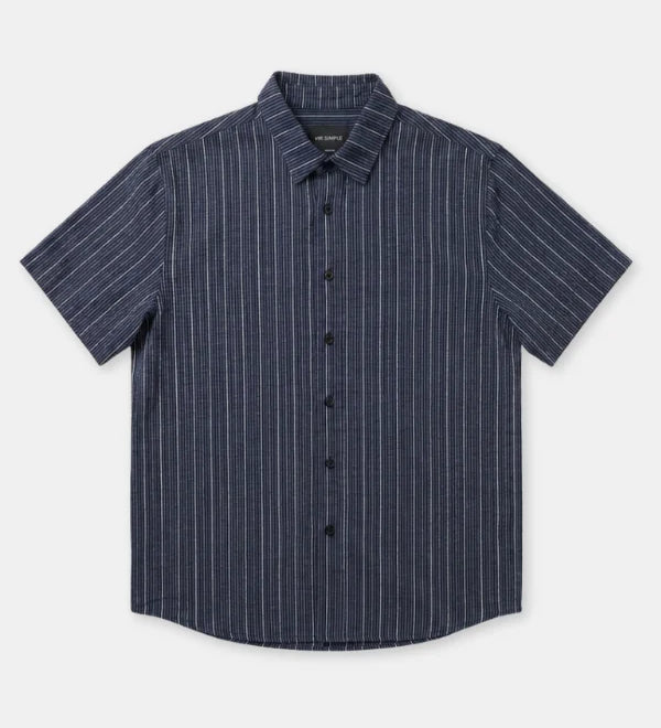 A short-sleeve button-up shirt with a navy blue base and thin white vertical pinstripes, displayed flat against a light gray background.