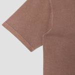 Brown t-shirt on a light gray background