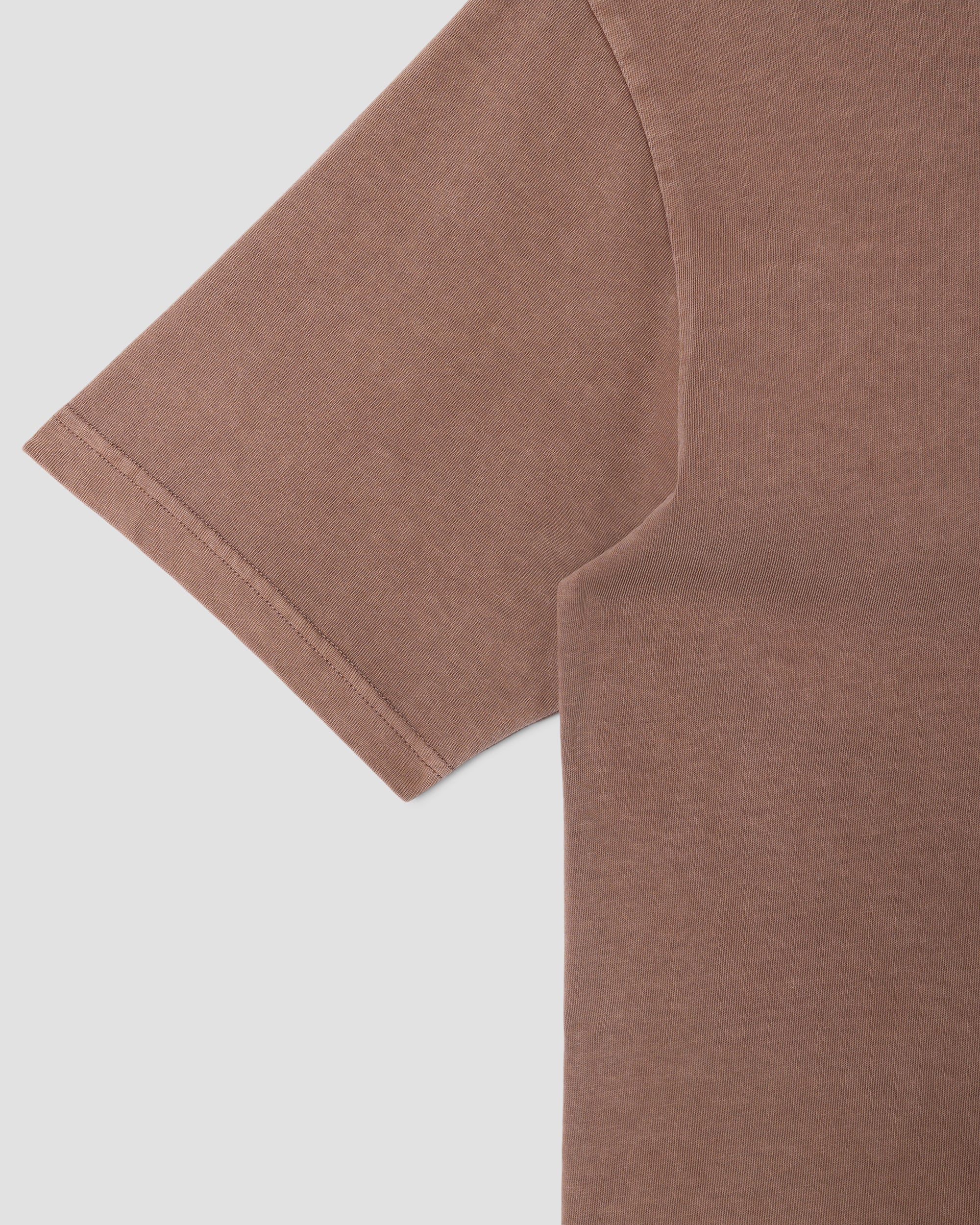 Brown t-shirt on a light gray background