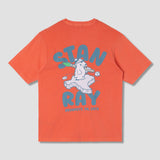 Orange t-shirt with graphic design and text on a gray background