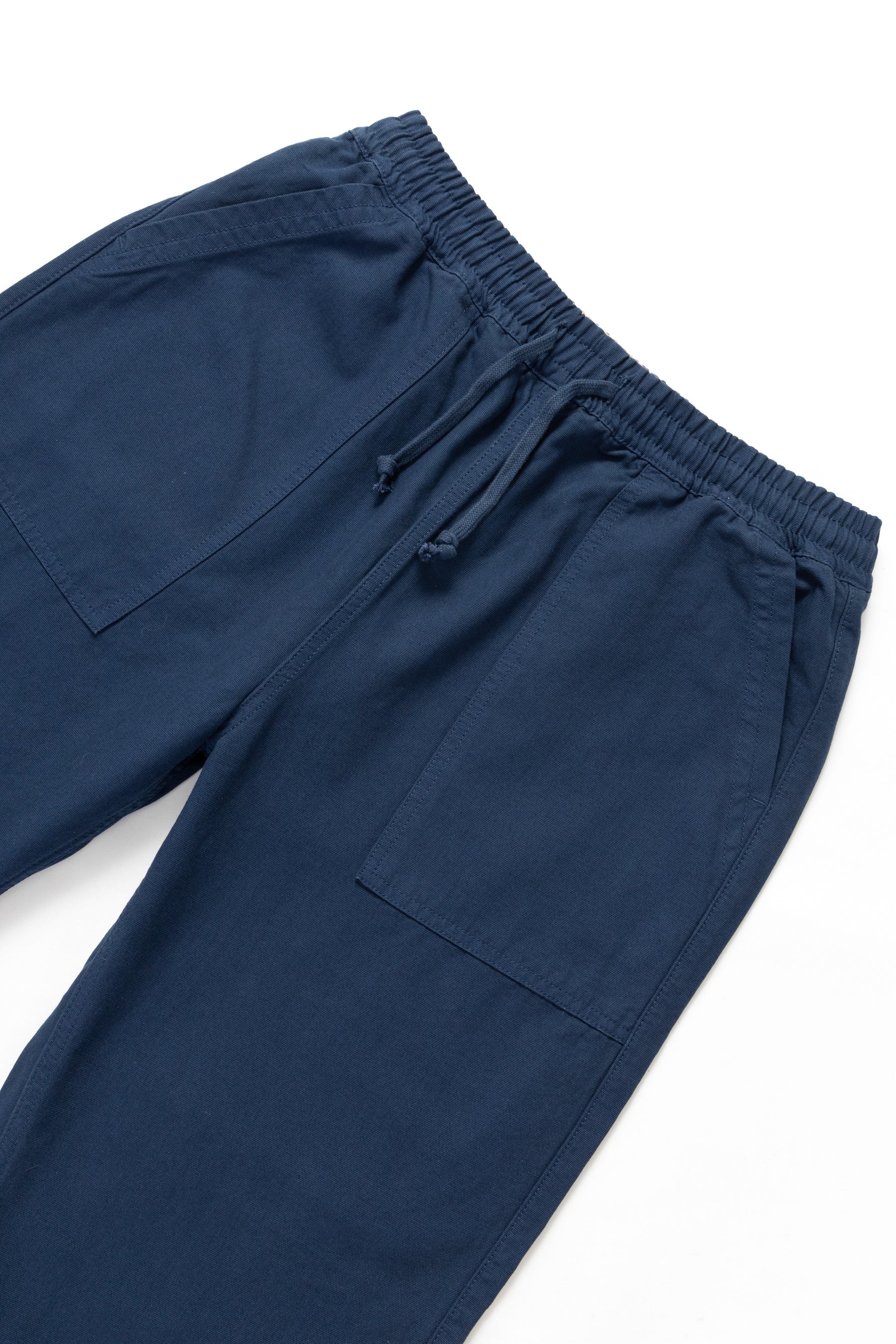 Navy blue pants on a white background