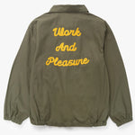 Green jacket with 'Work And Pleasure' text on the back against a white background