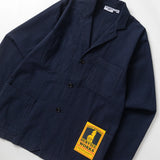 Navy jacket with a yellow label on a white background