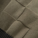 Close-up of a textured fabric with diamond pattern