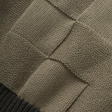 Close-up of a textured fabric with diamond pattern