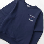 Navy blue sweatshirt with 'Service Works' logo on a white background