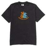 Black t-shirt with a colorful graphic and 'Service Works' text on a white background