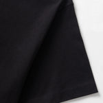 Black fabric on a white background