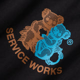 Black sweatshirt with brown and blue bear logo and 'Service Works' text.