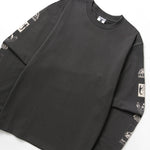 Black long-sleeve shirt with graphic designs on sleeves against a white background