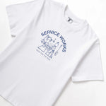 White t-shirt with blue graphic and text on a white background