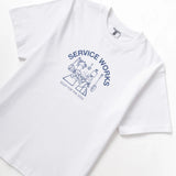 White t-shirt with blue graphic and text on a white background