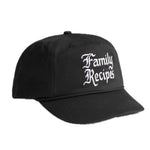 Black cap with 'Family Recipes' text on a white background