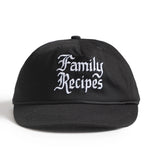 Black cap with 'Family Recipes' text on a white background
