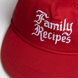 Red cap with 'Family Recipes' text on a white background