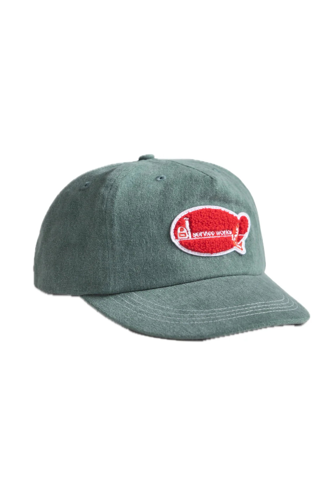 Green cap with a red and white logo on a white background