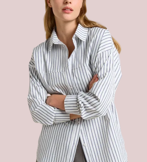 Woman wearing a striped shirt with text on a beige background
