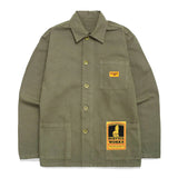 Green shirt with patches on a white background