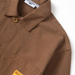 Brown jacket with visible brand labels on a white background