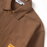 Brown jacket with visible brand labels on a white background