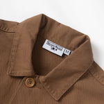 Brown shirt collar with a label on a white background