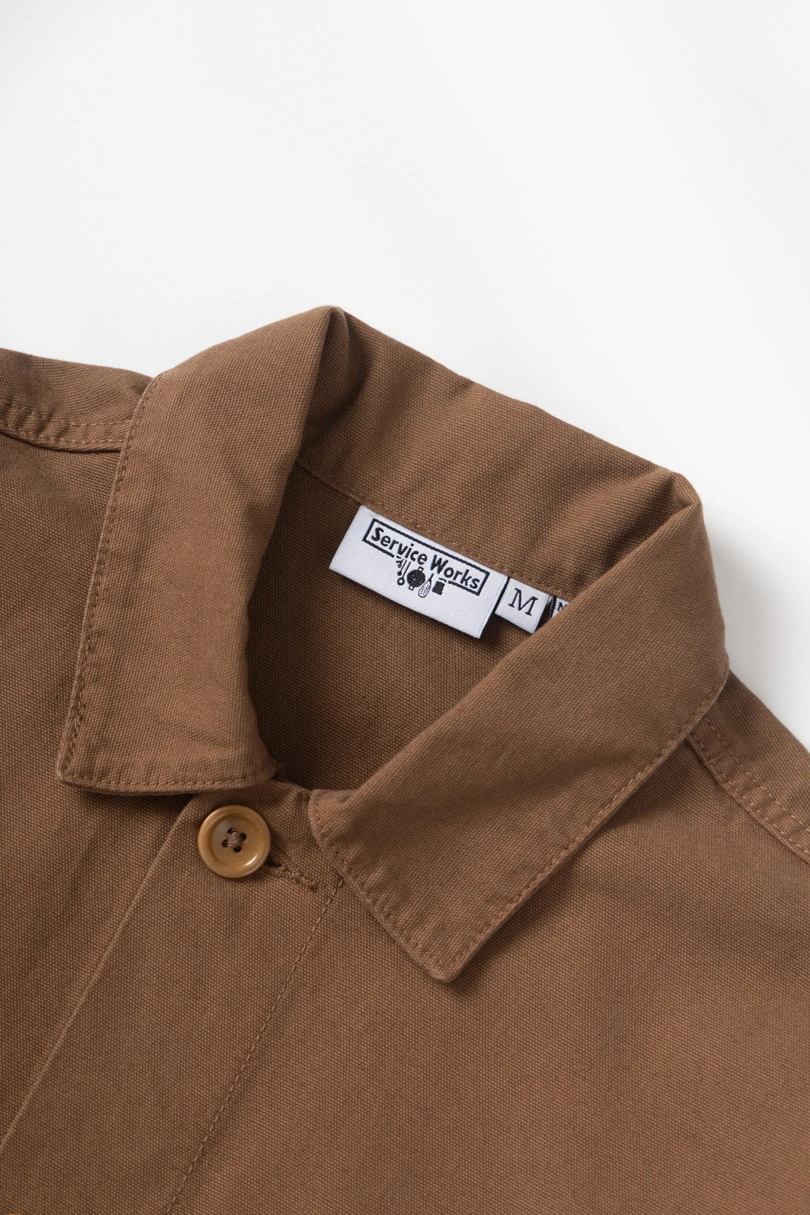 Brown shirt collar with a label on a white background