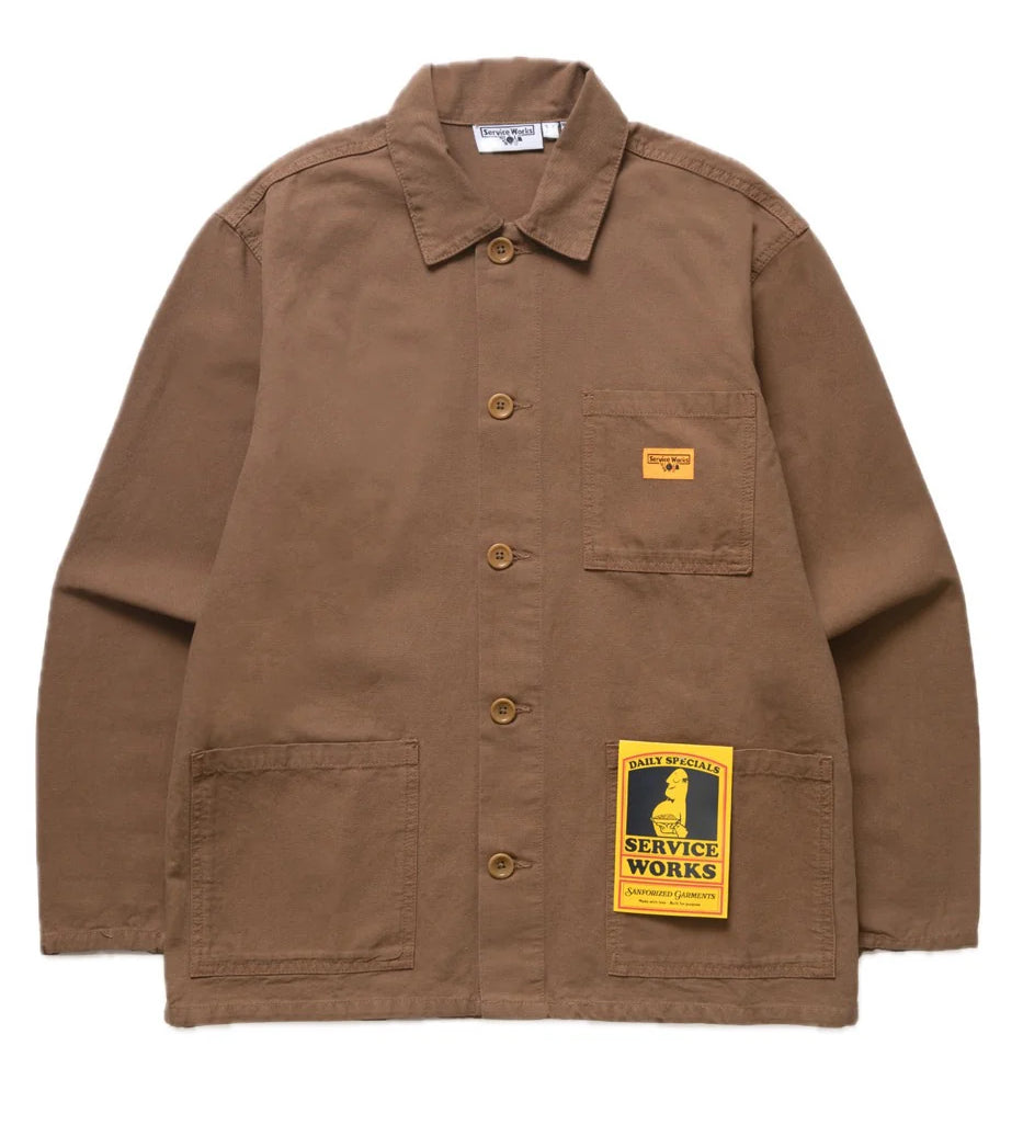 Brown jacket with a patch on a white background