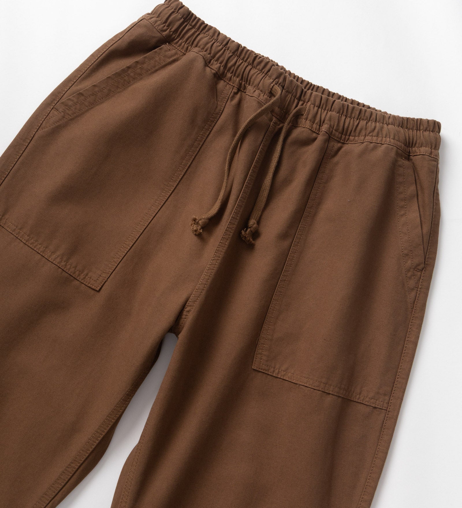 Brown pants with drawstring on a white background