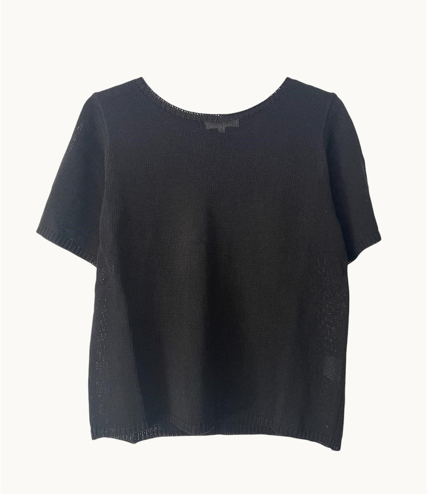 A black summer tee from Little Lies, displaying a short-sleeved, round neckline, and a casual fit.