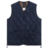 Navy quilted vest on a white background