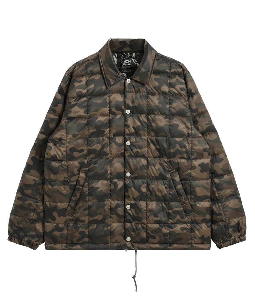 Camouflage quilted jacket on a white background