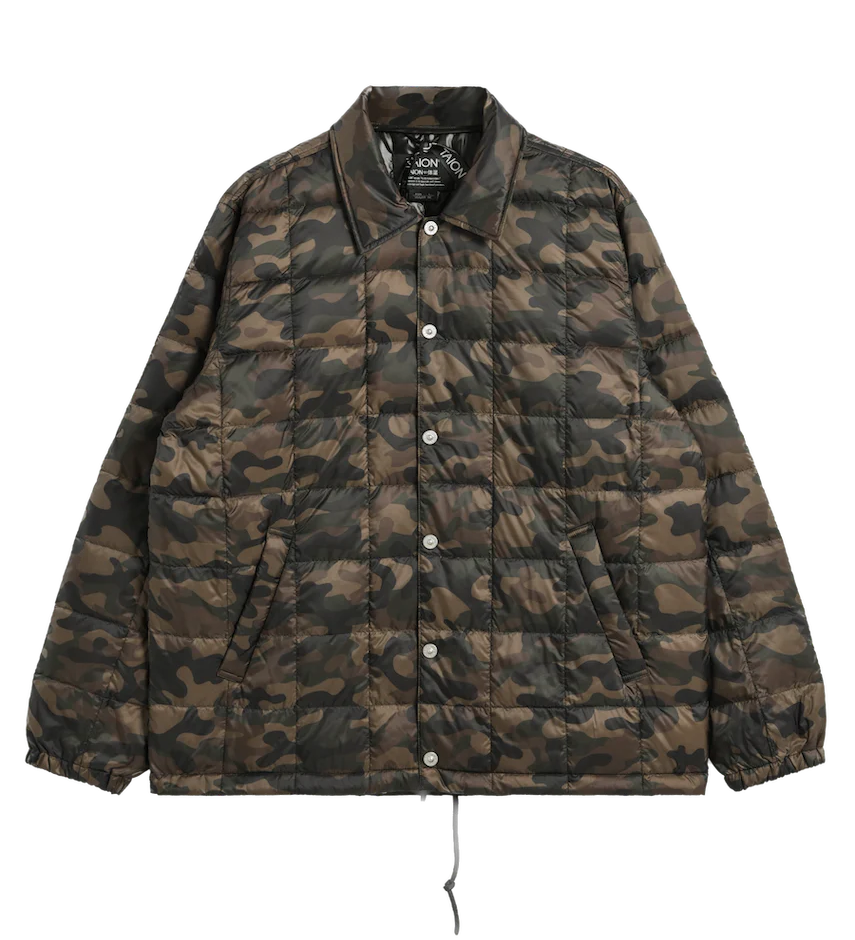 Camouflage quilted jacket on a white background