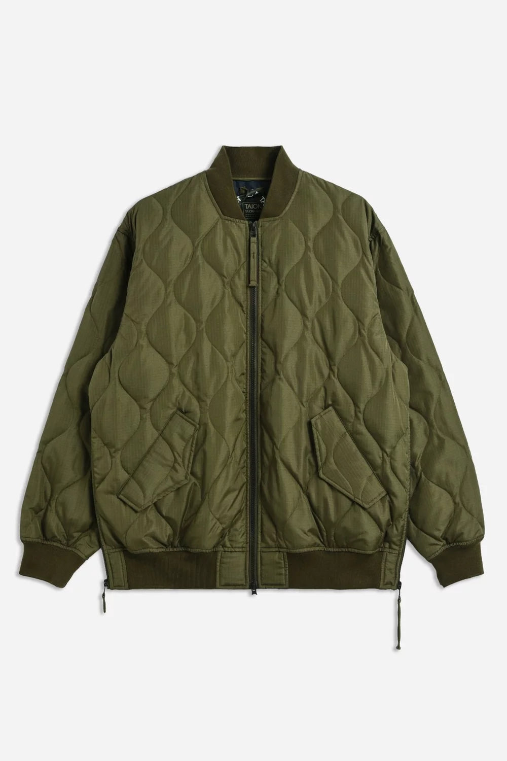 Quilted green jacket on a white background