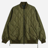 Quilted green jacket on a white background