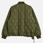Green quilted jacket on a white background