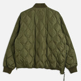 Green quilted jacket on a white background