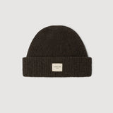 Ganache knit beanie with a small label on a light gray background