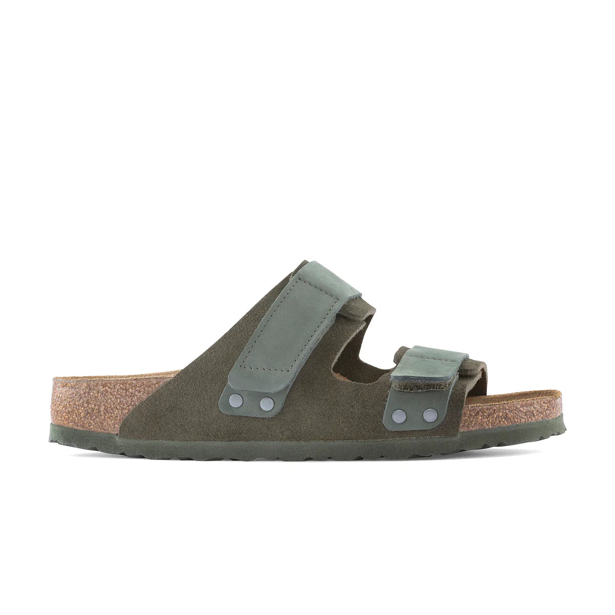 Green sandal with cork sole on a white background