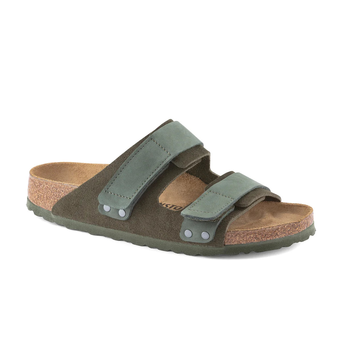 Green sandal with cork sole on a white background