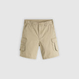 A pair of beige cargo shorts with side flap pockets, shown flat against a light gray background.