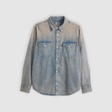 Denim shirt with gradient effect on a light gray background
