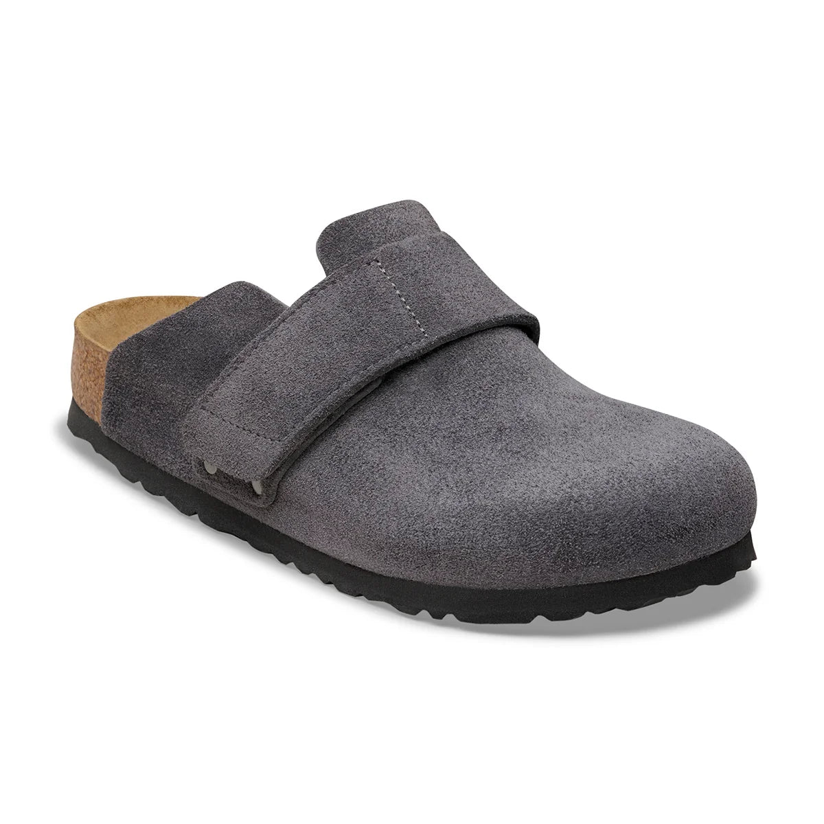 A single dark gray suede clog shoe with a hook-and-loop strap closure, a tan cork footbed, and a black outsole, shown on a white background.