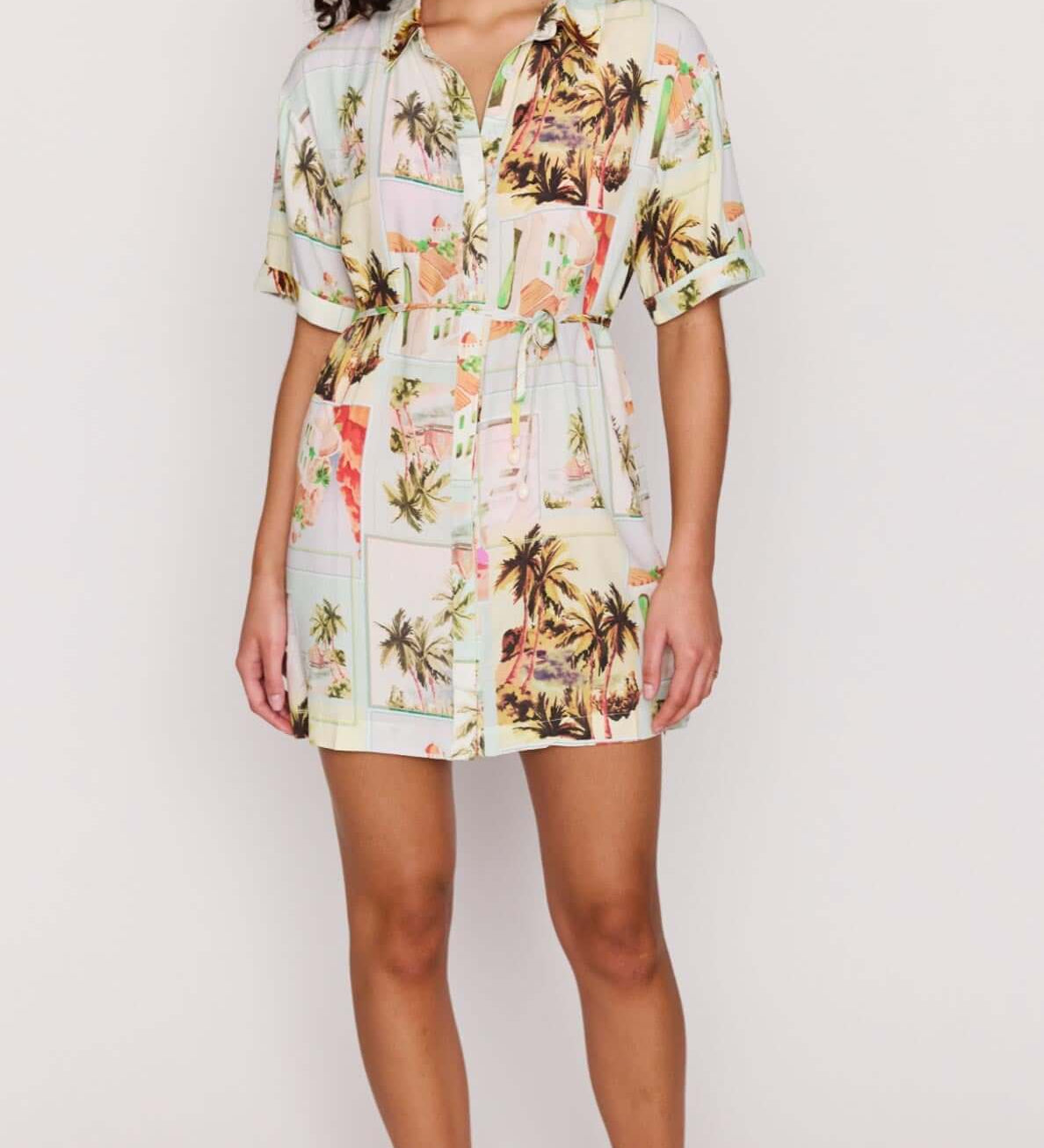 Woman wearing a floral dress on a white background