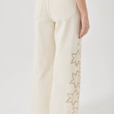 White pants with star patterns on a white background