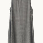 Black and white gingham dress on a white background